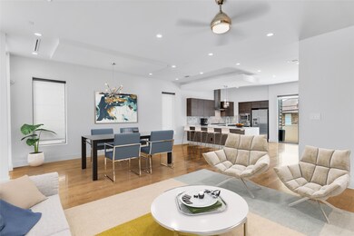 Another view of the living, dining, kitchen space