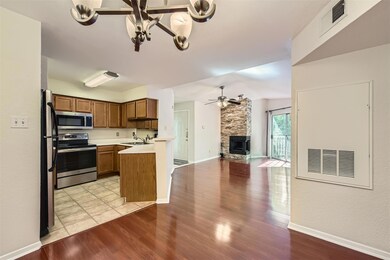 Kitchen featuring a ceiling fan, stainless steel 