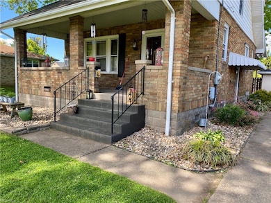 Another view of front & Beautiful Landscaping.