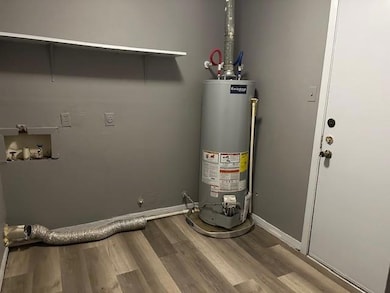 Utilities featuring gas water heater