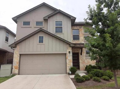 Craftsman-style home with stone siding, board and