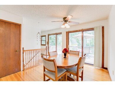 Dining room opens to family room and has two slidi