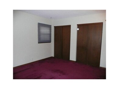 Master Bedroom. Hardwood floors under carpet in th