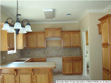 Beautiful stained wood cabinets with ceramic count