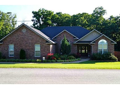 Exterior Front. Well Kept Yard