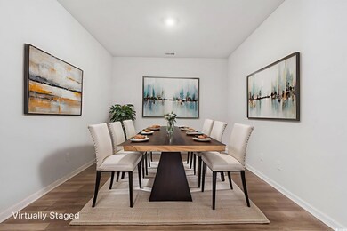 Dining space featuring wood finished floors