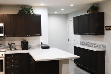 Quartz Counters and Loads of Cabinets