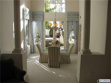 Formal dining room with 20 foot ceiling and double