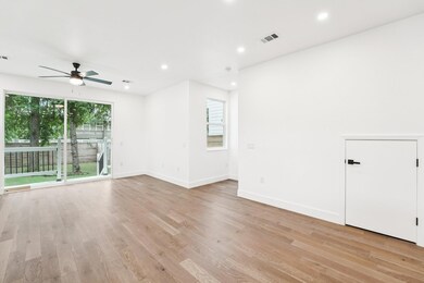 Spare room featuring ceiling fan, light wood-type