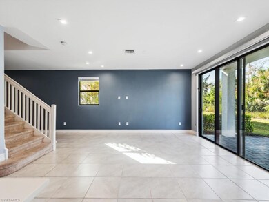 Unfurnished room featuring light tile patterned fl