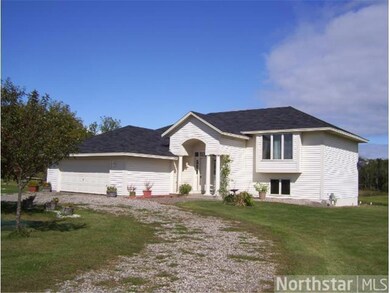 4 Br, 2 Ba split entry on 5.5 acre setting with sm