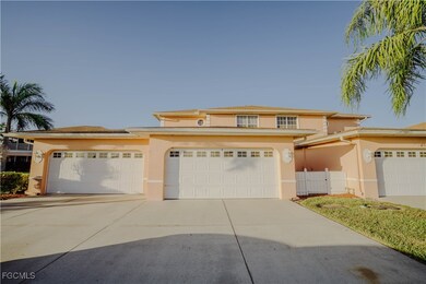 View of front of house featuring stucco siding, concrete driveway, and a garage