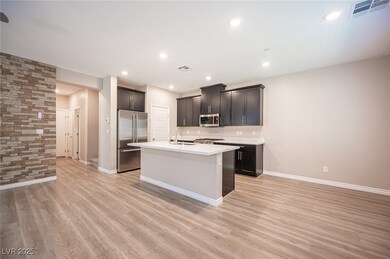 Kitchen featuring appliances with stainless steel