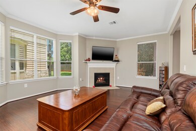 Family Room has a delightful bay window, crown mol