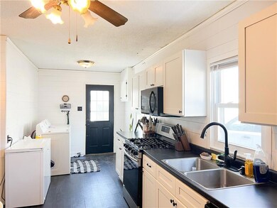 Kitchen updates include cabinets, flooring