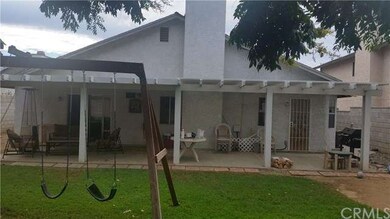 Lush green grass, aluma wood patio cover, length o