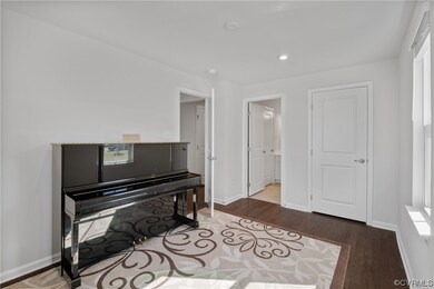 Misc room with wood-type flooring