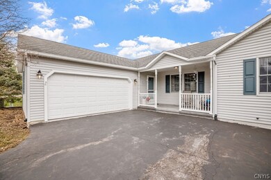A nice front porch and 2 car garage.