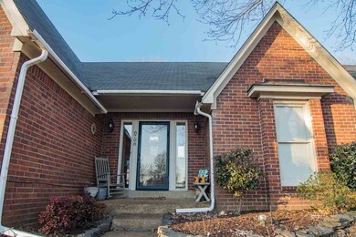 Step up to this attractive entry and charming fron