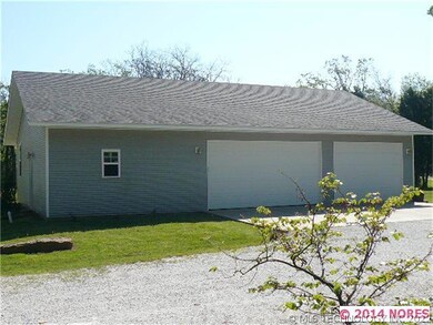Large detached garage.