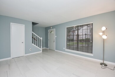 Entrance to the spacious living room with access t