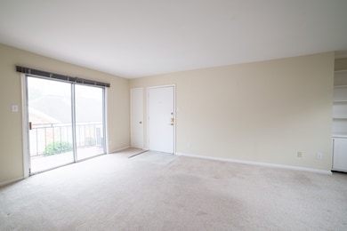 Living opens up to a private balcony