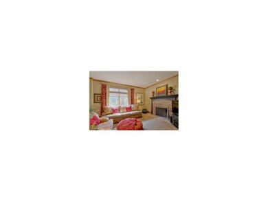 Den/study on main level with charming brick firepl