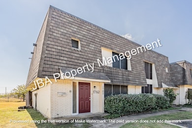 View of front of property with brick siding
