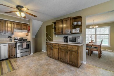 Kitchen with stainless steel appliances.