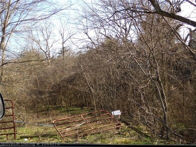 Entrance gate on West side of creek
