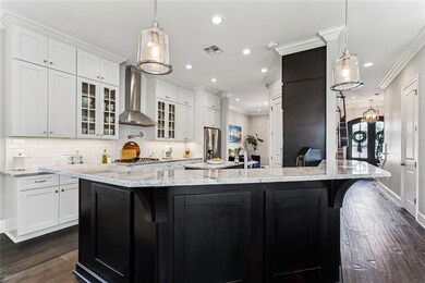 Kitchen overlooks Living + Breakfast Nook