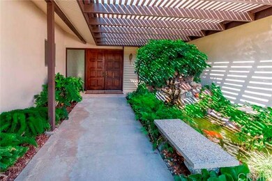 Front Entry with Pond