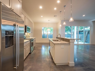 Kitchen featuring stainless steel appliances, rec