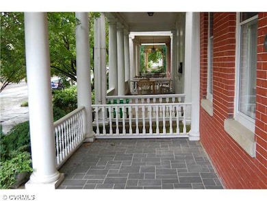Porch - Covered front porch with slate patio