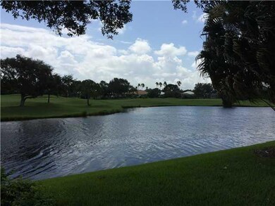 Exterior Back. VIEW FROM COVERED SCREENED PORCH