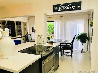 Newly remodeled modern kitchen, with sleek quorts 
