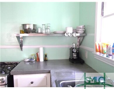 Kitchen. Kitchen has stone counter tops.  Stainles