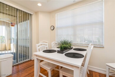 Eat-in kitchen with slider to screened lanai