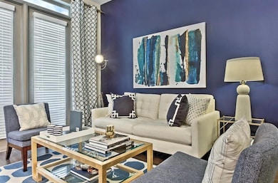 Living room with hardwood / wood-style floors