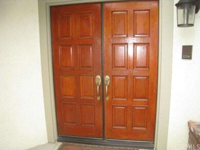 Double-door front entry and doorbell with intercom