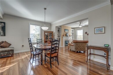 Dining room showcasing beautiful hardwood flooring