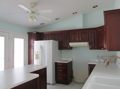 Kitchen with French doors to deck area