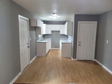 Back door on left, garage door on right