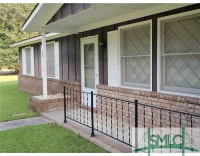 Exterior Front. Nice front porch for plants or cha