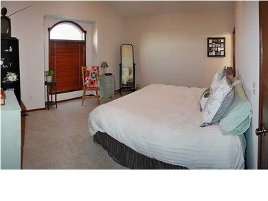 Don't miss the tall arched windows.