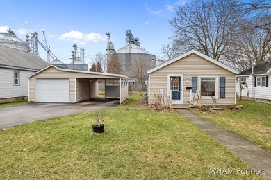 209 Maple St, Lowell, MI 49331 - photo 2