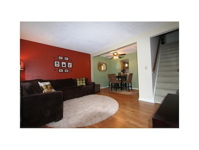 Living Room. Warm colors, large windows and natura