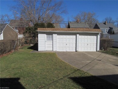 A two car garage with electric, opener and attache