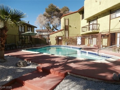 Pool with fence and a patio