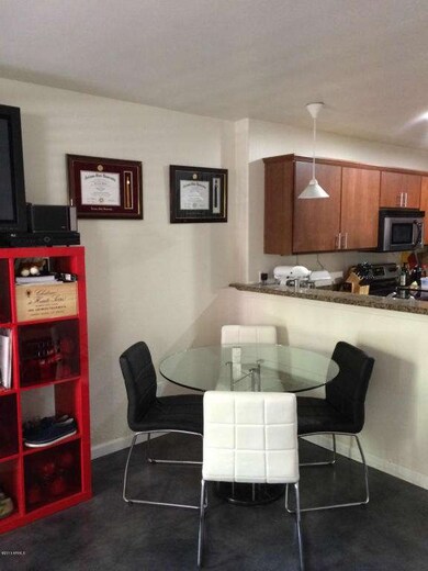 Dining Area with Peek into Kitchen